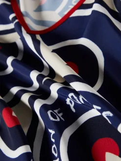 Blusa decote em V com padrão geométrico