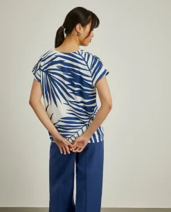 Blusa fluida com padrão palmeiras