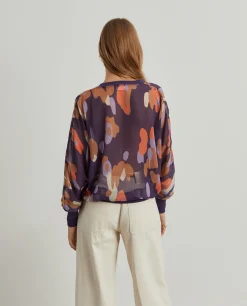 Blusa fluida estampada semi-transparente