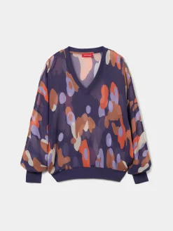 Blusa fluida estampada semi-transparente