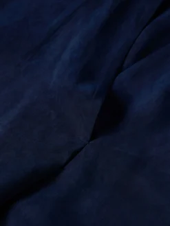 Blusa sem mangas em cupro