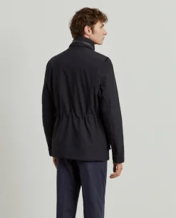 Blusão acolchoado com capuz e bolsos