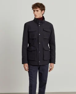 Blusão acolchoado com capuz e bolsos