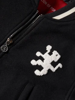 Blusão bomber com leão no peito