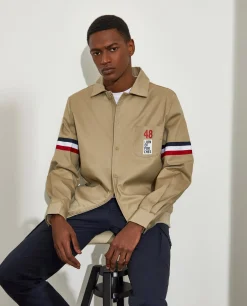Blusão de algodão com pormenor de riscas e bolso no peito
