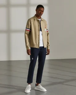 Blusão de algodão com pormenor de riscas e bolso no peito