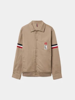 Blusão de algodão com pormenor de riscas e bolso no peito