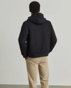 Blusão de malha com capuz e frente em tecido técnico