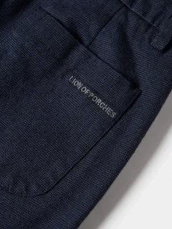 Calças chino com cordões