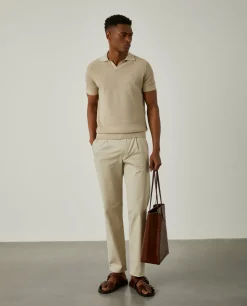 Calças chino em sarja com pregas