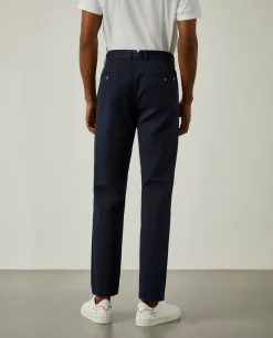 Calças chino em sarja com pregas