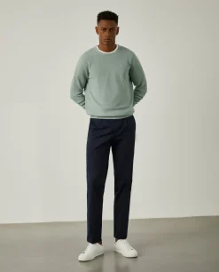 Calças chino em sarja com pregas