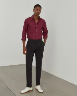 Calças chino regular fit com pregas