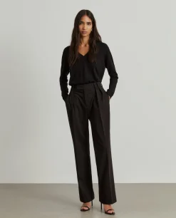 Calças clássicas com pregas