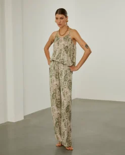 Calças de perna larga com padrão abstrato