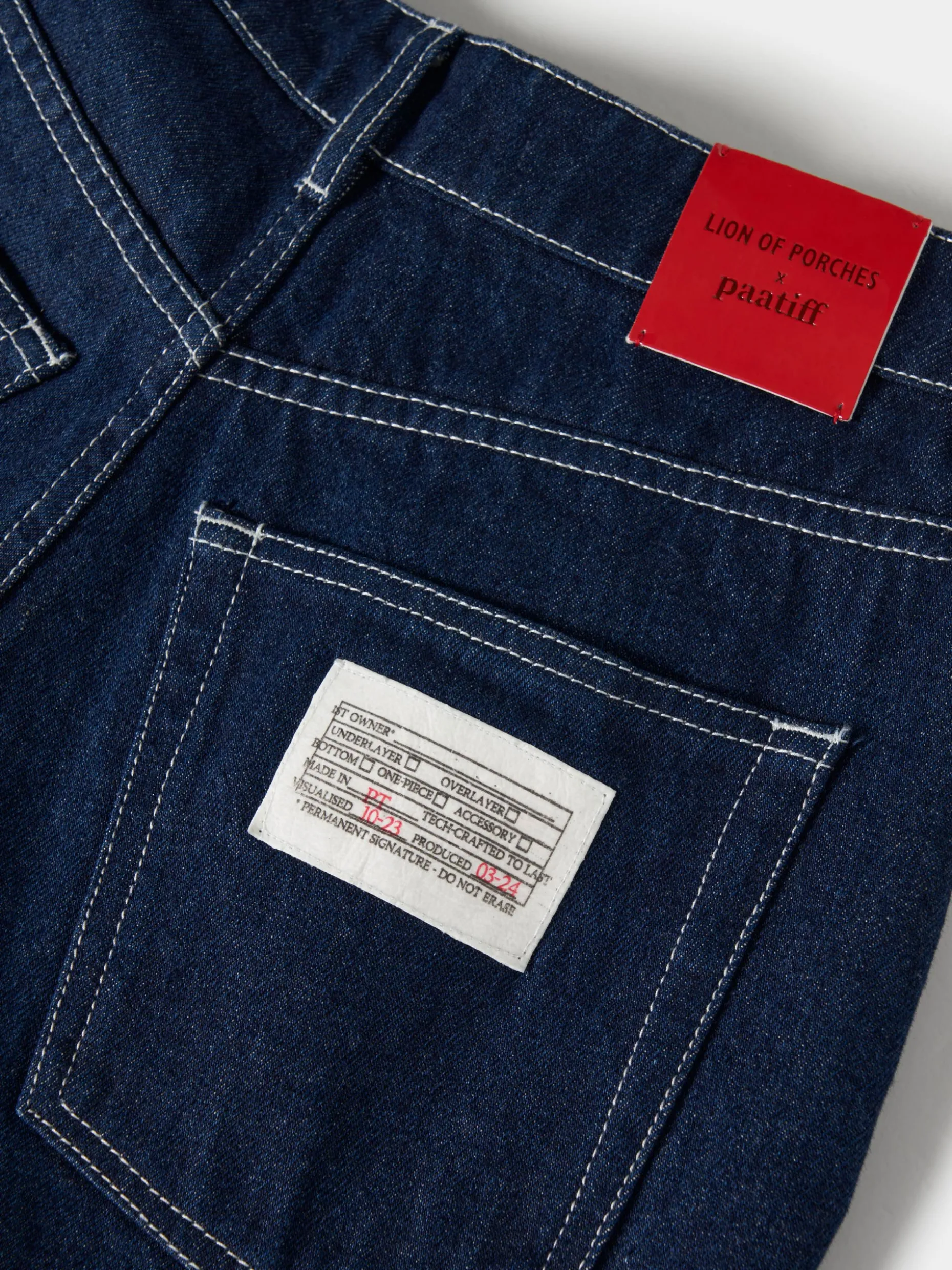 Calças denim Lion of Porches x Paatiff