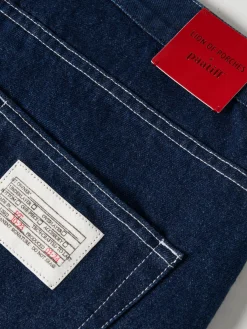 Calças denim loose fit Lion x Paatiff