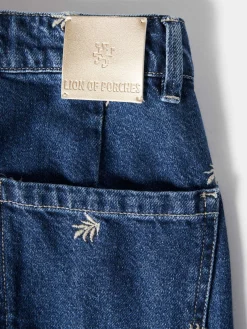 Calças denim wide leg com bordados