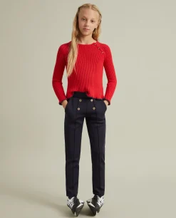 Calças em malha com botões e vincos