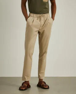 Calças jogger em malha técnica com cordão