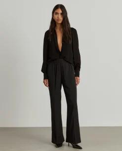 Calças largas com cintura elástica