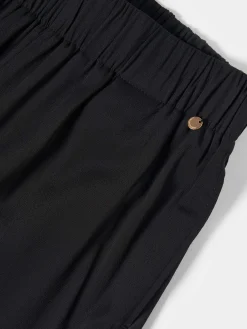 Calças largas com cintura elástica