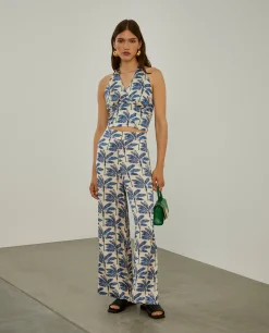 Calças pantalona com padrão de palmeiras