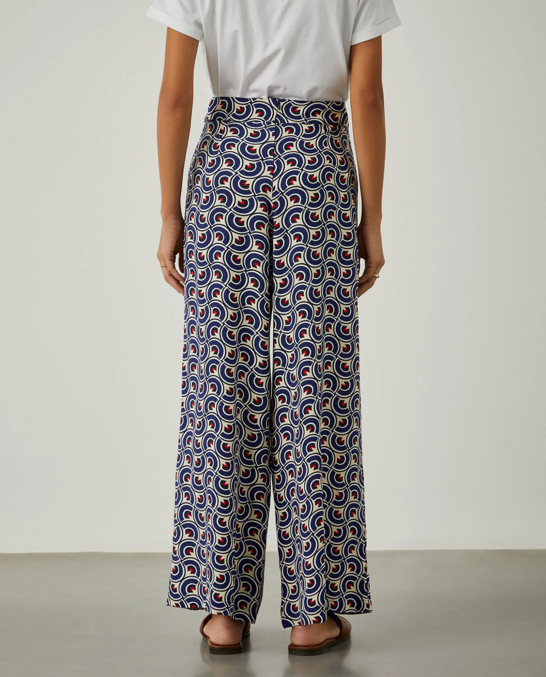 Calças pantalona com padrão geométrico