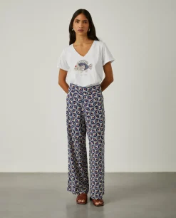 Calças pantalona com padrão geométrico