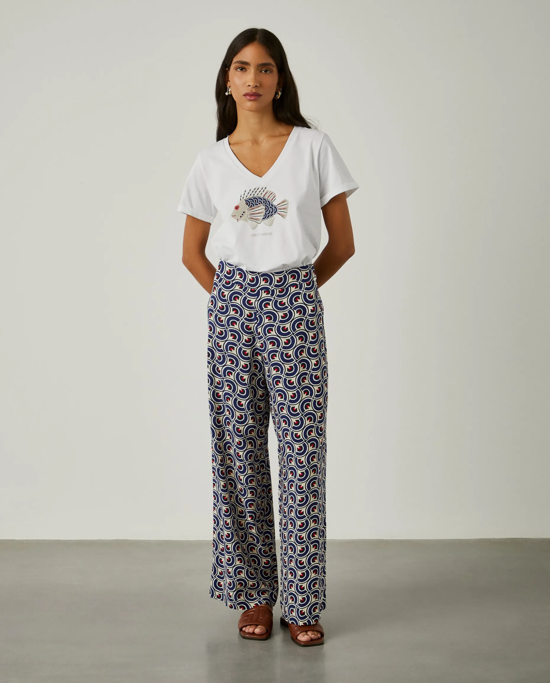 Calças pantalona com padrão geométrico