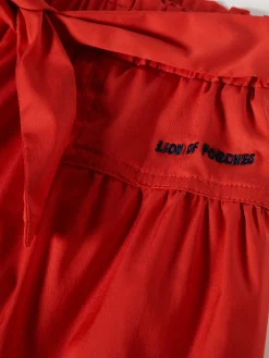 Calças perna larga com cinto