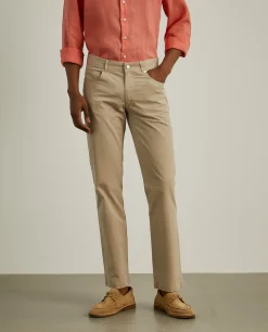 Calças regular fit com cinco bolsos