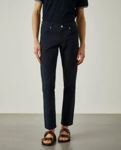 Calças regular fit com cinco bolsos