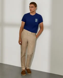 Calças regular fit de algodão com cordão