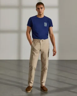 Calças regular fit de algodão com cordão