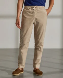 Calças regular fit de algodão com cordão