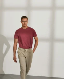 Calças regular fit de algodão com cordão