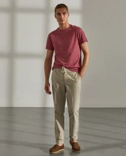 Calças regular fit de algodão com cordão