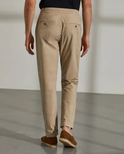 Calças regular fit de algodão com cordão