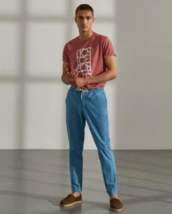 Calças regular fit de algodão com cordão