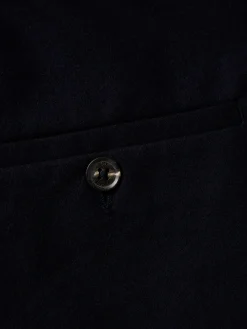 Calças slim fit com pregas