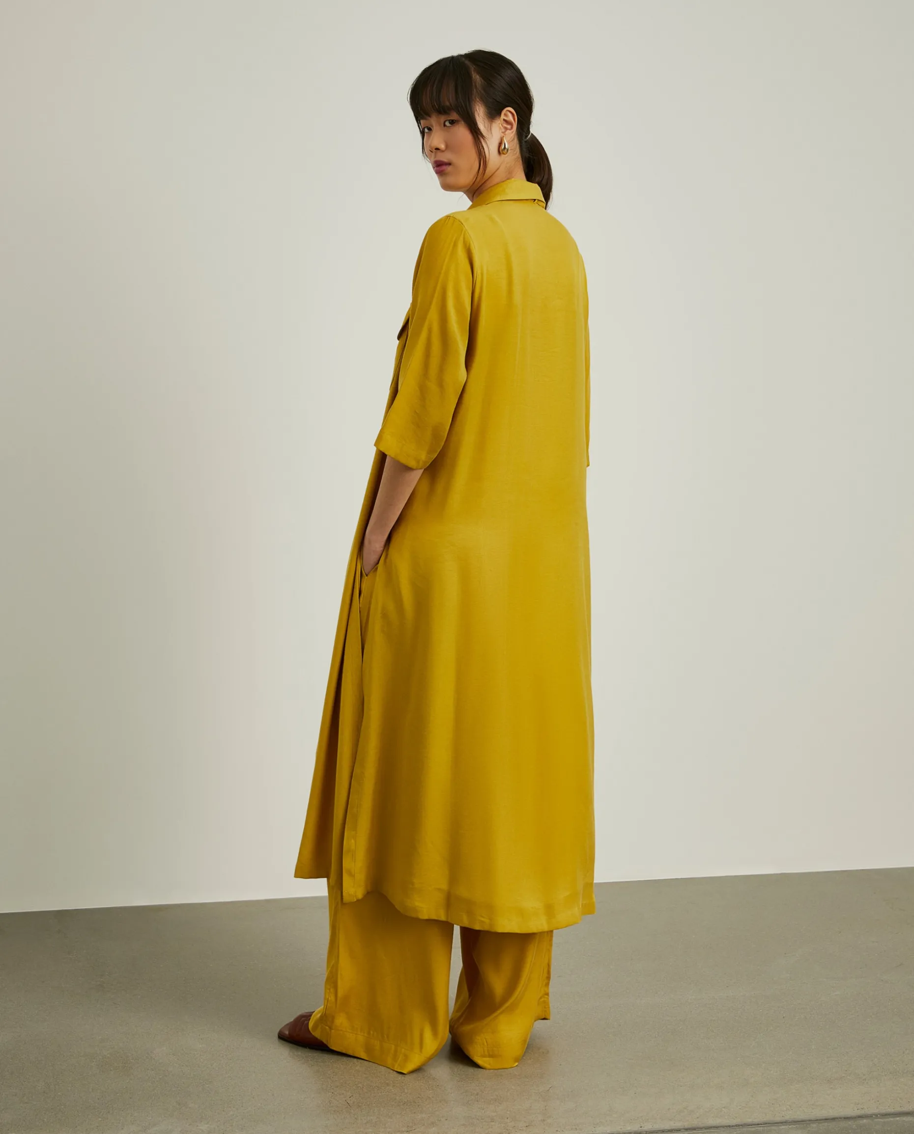 Camisa comprida com laço