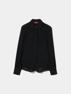 Camisa fluida com transparências