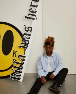 Camisa oxford com borboletas no bolso Lion x Killa