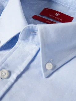 Camisa regular fit de algodão em cor lisa