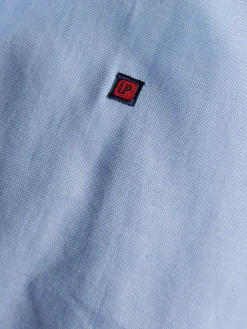 Camisa slim fit de algodão em cor lisa