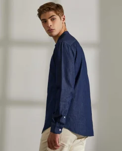 Camisa slim fit denim com carcela de polo