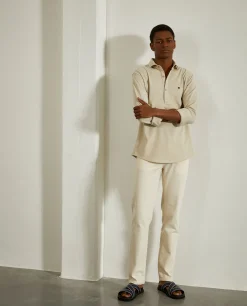 Camisa slim fit em malha piqué com carcela de polo