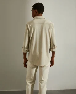 Camisa slim fit em malha piqué com carcela de polo