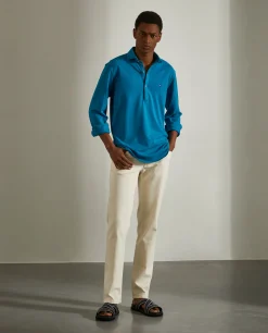 Camisa slim fit em malha piqué com carcela de polo